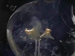 ECU SLO MO Shot of light bulb, showing burning and smoking tungsten wire / Munich, Bavaria, Germany Stock Footage