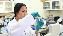 Young Asian women scientist working with pipette in laboratory Stock Footage