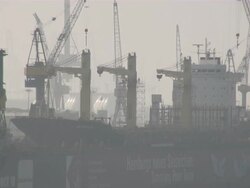 WS One big ferry laying in dry dock of Blohm & Voss shipyard at foggy climate / Hamburg, Hamburg, Germany Stock Footage