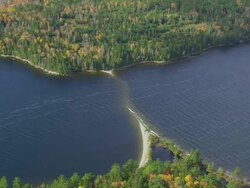 WS ARIEAL View of Natural bridge of sand in Moosehead lake / Maine, United States Stock Footage