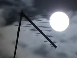moon with clouds fast and television antenna Stock Footage