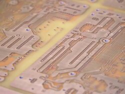 Medium Close Up static - An etched circuit board moves over rollers /  Texas, United States Stock Footage