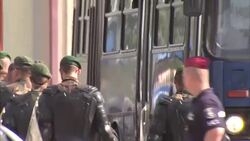 Coaches Filled With Migrants Arrive in Beremund, Hungary News Clip