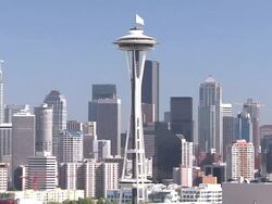Long Shot pan-right-The Space Needle marks Seattle's skyline in downtown near Starbucks headquarters. / Seattle, Washington, USA Stock Footage
