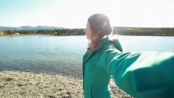 Personal perspective of woman by the lake Stock Footage