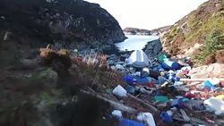 Drone footage of plastic waste on island News Clip