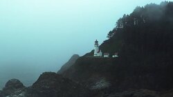 Heceta Lighthouse in the fog long shot cool Stock Footage