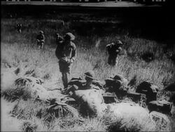 PAPUAN CLOSE-UP OF JUNGLE WARFARE - News Clip