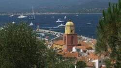 St Tropez with Church Bell Tower and yachts in the distance.4K Stock Footage