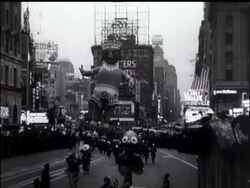 Festivity: Â® Description by Leslie Mitchell. News Clip