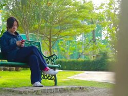 Dolly Shot:Girl play smart phone Stock Footage