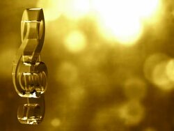 Glassy Musical Symbol Spin Background Loop - Textured Gold HD Stock Footage