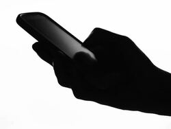 isolated:Typing smart phone Silhouette Stock Footage