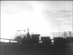 B/W 1915 waves crashing over deck of Lusitania after being torpedoed by a German U-boat / newsreel Stock Footage