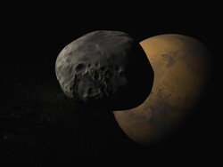 Fly past the moon Deimos towards planet Mars Stock Footage