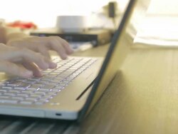 woman Typing at Keyboard,Dolly shot Stock Footage