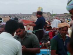 Unidentified Indian fishermen prep their boats to go fishing Stock Footage