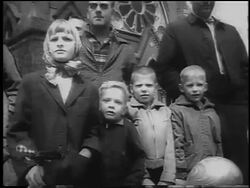 B/W 1962 low angle group of children standing outdoors watching Boston Marathon / newsreel Stock Footage