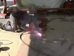 MS Shot of welder at bridge construction / Wellen, river Moselle, Germany Stock Footage