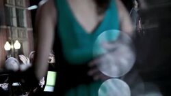 Excited fans scream and wave as celebrity couple makes way down red carpet towards limousine at awards show Stock Footage