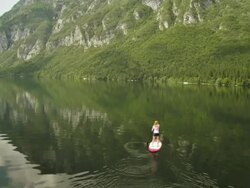 Aerial Shot Of A Woman SUPing Stock Footage