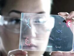 Woman the scientist is analysing structure DNA. Stock Footage