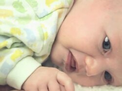 Newborn being comforted Stock Footage
