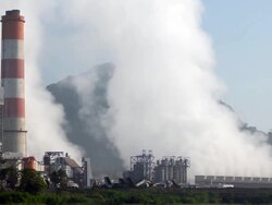 Coal fired power station with smoke stack Stock Footage