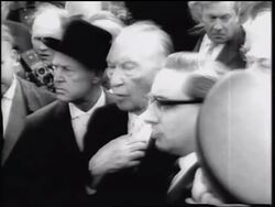 B/W 1961 close up Chancellor Konrad Adenauer standing in crowd outdoors / Berlin / Germany / newsreel Stock Footage