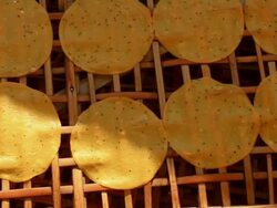 CU SLO MO Shot of bamboo panel covered with cassava crackers / Luang Prabang, Laos Stock Footage
