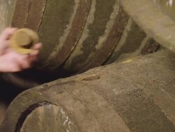  CU Man opening barrel, measuring rod and checking wine level / Sanlucar de Barrameda, Andalusia, Spain Stock Footage