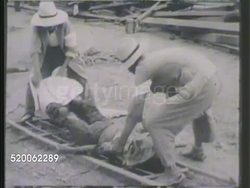 1942: CHINA: SECOND SINO-JAPANESE WAR: ** SEMI-GRAPHIC VS Chinese people lifting dead body onto stretcher, others carrying dead body w/ rope & bar, GRAPHIC carrying burnt body on stretcher. World War II, WWII, bombing, death, dead, deceased, killed Instructional Video