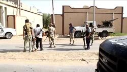 CLEAN : Libya fighters look for Kadhafi loyalists near the capital News Clip