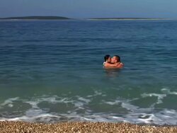 HD: Kissing In The Sea Stock Footage