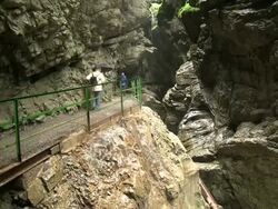 MS Tourist enjoying at canyon Breitachklamm near Allgau Alps / Oberstdorf, Bavaria, Germany Stock Footage