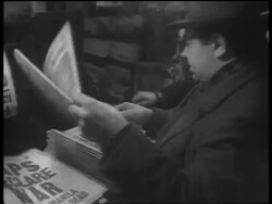 B/W Dec. 7 1941 man buying evening newspaper reading 'Japs bomb Hawaii' / newsreel Stock Footage