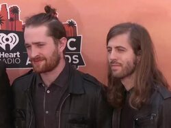 Ben McKee, Dan Reynolds, Daniel Platzman and Wayne Sermon of Imagine Dragons at the 2014 iHeartRadio Music Awards - Arrivals Stock Footage