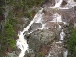 MS AERIAL TS TD PAN View of waterfall at Crawford Notch State Park / New Hampshire, United States Stock Footage