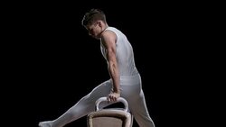 SLO MO Gymnast mounting pommel horse and performing routine Stock Footage