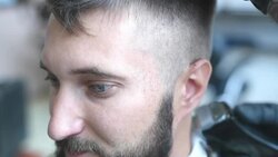 brutal barber clipper mows bearded hipster Stock Footage