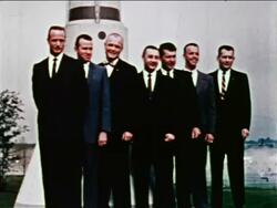 1959 PORTRAIT original seven astronauts wearing suits posing for group photo / newsreel Stock Footage