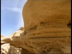 Eroded boulders on Mediterranean coast, Israel Stock Footage
