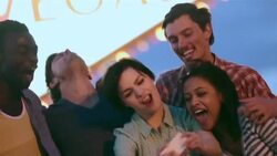 Friends take funny smartphone photos under classic Welcome To Las Vegas sign Stock Footage