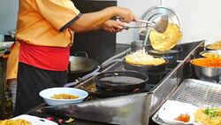 Beautiful chef cooking seafood Stock Footage