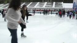 Slow Motion of Skating on Artificial Ice at Bryant Park in New York City. Stock Footage