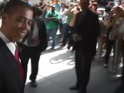 President Barack Obama impersonator Reggie Brown is all smiles as he arrives at NBC Studios in New York 06/20/11 (Footage by WireImage Video/Getty Images Entertainment Video) Stock Footage