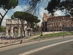 Crowd of tourists by the Coliseum of Rome Stock Footage
