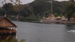 speed boat drive through lake mountain view Stock Footage