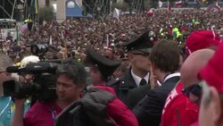 VOICED : Peregrinos celebran canonizacion historica News Clip