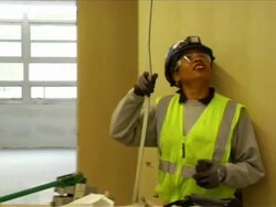 Female Construction Worker with Male Colleagues Stock Footage